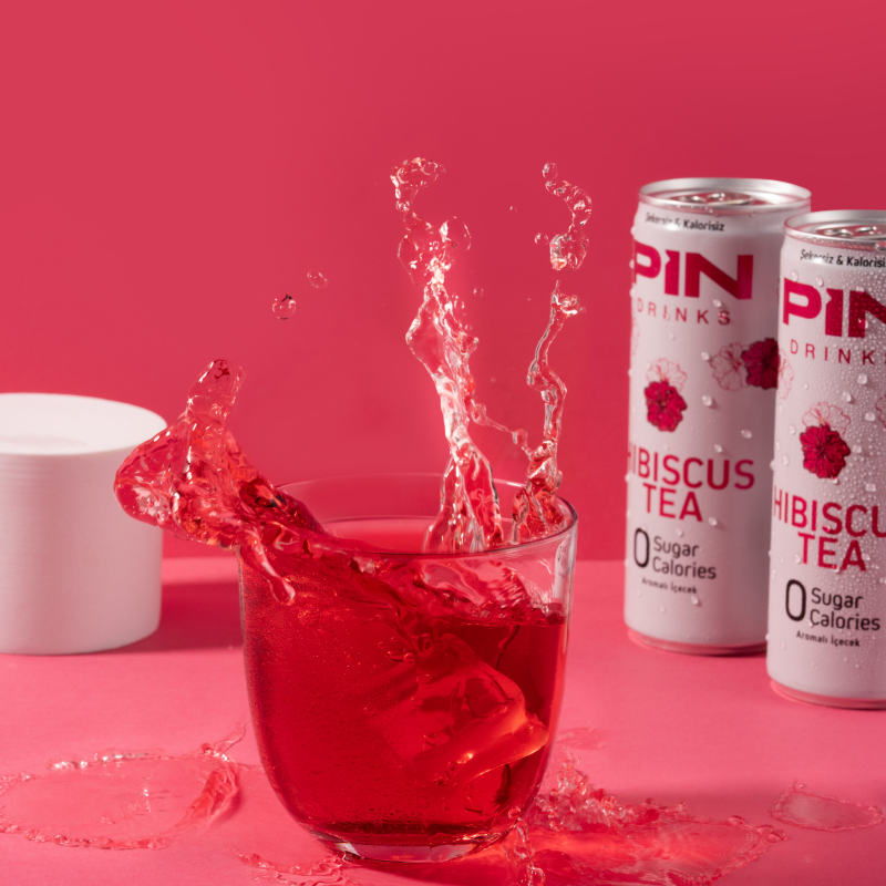 PIN Drinks Hibiscus - A fragrant and exotic blend promoting relaxation. Sugar-free, calorie-free, preservative-free, colorant-free, plant-based, gluten-free, and vegan beverage.